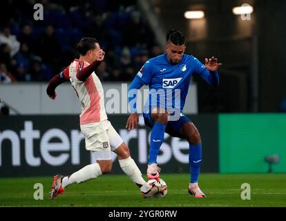 Sinsheim, Deutschland. November 2024. 07.11.2024, PreZero-Arena, Sinsheim, Europa League, TSG 1899 Hoffenheim vs Olympique Lyon, Foto Maxence Caqueret (Lyon), Kevin Akpoguma (Hoffenheim) Credit: dpa/Alamy Live News Stockfoto