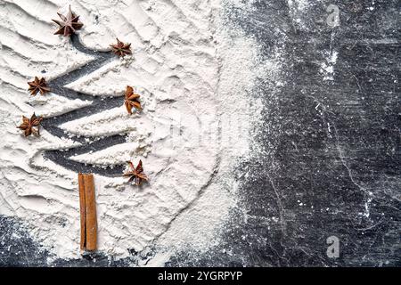 Bayern, Deutschland - 8. November 2024: Ein Weihnachtsbaum aus Mehl und Anissternen, verziert mit einem Zimtstab. Weihnachtshintergrund mit Freitext *** ein Tannenbaum zu Weihnachten aus Mehl und Anissternen, dekoriert mit Zimtstange. Weihnachts-Hintergrund mit Textfreiraum Stockfoto