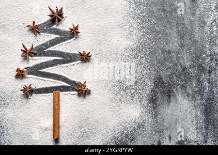 Bayern, Deutschland - 8. November 2024: Ein Weihnachtsbaum aus Mehl und Anissternen, verziert mit einem Zimtstab. Weihnachtshintergrund mit Freitext *** ein Tannenbaum zu Weihnachten aus Mehl und Anissternen, dekoriert mit Zimtstange. Weihnachts-Hintergrund mit Textfreiraum Stockfoto