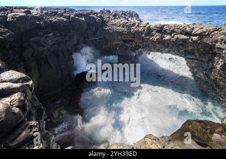 Pont Naturel, naturel Bridge, Naturbrücke, Felsbrücke, Surf, südküste, Indischer Ozean, Insel, Mauritius, Afrika Stockfoto