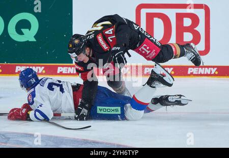 Landshut, Deutschland. November 2024. Justin Schuetz Nr.74 von Deutschland konkurrieren, zweikampf, Kampf um den Puck gegen Marek Korencik, SVK 24 beim Spiel DEUTSCHLAND - SLOWAKEI 2-6 DEB EISHOCKEY DEUTSCHLAND CUP in Landshut, Deutschland, 9. November 2024, Saison 2024/2025. Fotograf: ddp Images/STAR-Images Credit: ddp Media GmbH/Alamy Live News Stockfoto
