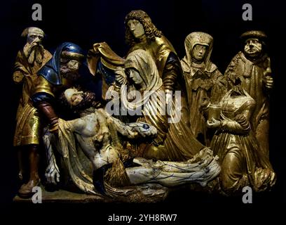 Klage über den toten Christus von Lienhart ASTL 1515-1520, Österreich, Österreich. ( Beklagung Christi, nachdem Jesus gekreuzigt wurde, Kreuzigung, sein Leichnam wurde entfernt, Kreuz , seine Freunde trauern um seinen Leichnam, Beklagung über den toten Christus ) geschnitztes und gemaltes Kalkholz ( Museum für schöne Kunst Budapest ) Altarstück von Santa Cristina XV Jahrhundert, Tempera - Holz, Kapelle Santa Cristina de Corca (El Baix Emporda), Spanien, 16. Jahrhundert Stockfoto
