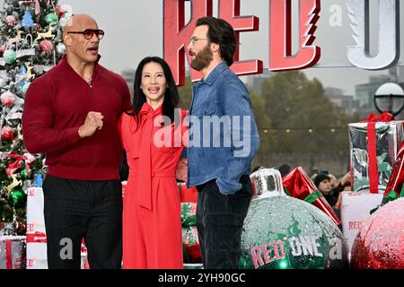 Dwayne Johnson, Lucy Liu, Chris Evans, Red One Photocall, Potters Field, London, Großbritannien Stockfoto