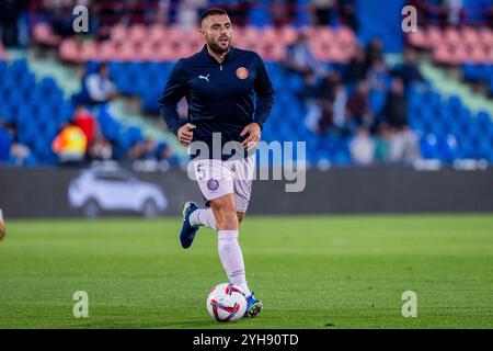 Getafe, Madrid, Spanien. November 2024. David Lopez vom Girona FC wärmt sich beim Fußballspiel La Liga EA Sports 2024/25 zwischen Getafe CF und Girona FC am 10. November 2024 im Estadio Coliseum in Getafe auf. (Kreditbild: © Alberto Gardin/ZUMA Press Wire) NUR REDAKTIONELLE VERWENDUNG! Nicht für kommerzielle ZWECKE! Stockfoto