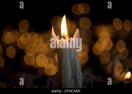 Candles burning in the votive room of the Sanctuary of Our Lady of Rocio, El Rocio village, Almonte, Huelva province, Andalusia, Spain. Stock Photo