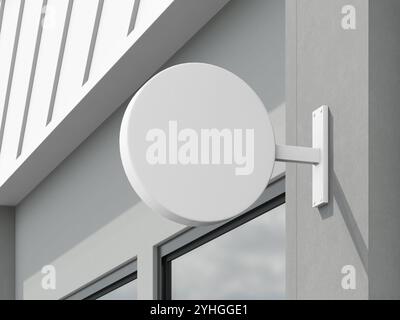 Weißes leeres rundes Metallwandschild mit realistischem Gebäude Stockfoto