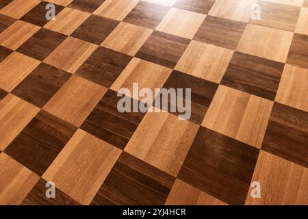 Vintage-Parkett mit kariertem geometrischem Muster. Hintergrundfoto Stockfoto