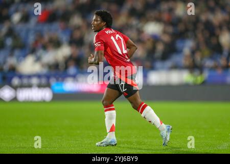 Huddersfield, Großbritannien. November 2024. Manchester United Verteidiger Tyrell malacia im Spiel des Huddersfield Town FC gegen Manchester United FC U21 beim Spiel der Bristol Street Motors EFL Trophy Northern Group F im John Smith's Stadium, Huddersfield, England, Großbritannien am 12. November 2024 Credit: Every Second Media/Alamy Live News Stockfoto