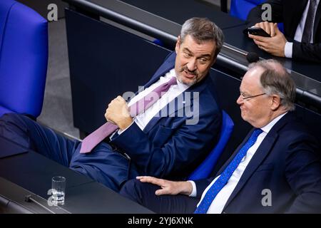 Berlin, Deutschland. November 2024. Bayerns Premierminister Markus Soeder (L) und Niedersächsischer Ministerpräsident Stephan weil (R) treten am 13. November 2024 während einer Plenartagung im Unterhaus des Bundestages in Berlin auf. (Foto: Emmanuele Contini/NurPhoto) Credit: NurPhoto SRL/Alamy Live News Stockfoto