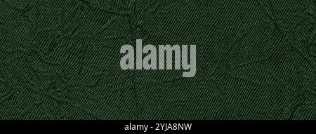 Dunkelgrüner welliger Hintergrund aus einem Textilmaterial. Stoff mit Falzstruktur in Nahaufnahme. Gefaltetes, glänzendes smaragdgrünes Tuch. Stockfoto