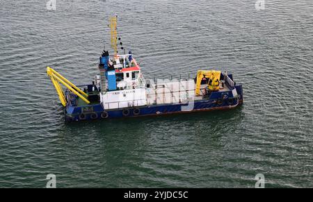 UKD Sealion Bagger in Southampton Water, Hampshire. Stockfoto