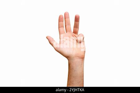 Die Hand des isolierten Mannes zeigt vier Finger. Der kleine Finger wird nach innen gebogen, um den ersten Zähler darzustellen. Stockfoto