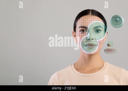 Gesichtserkennungssystem und Iris-Erkennungssystem. Frau, die sich einer biometrischen Verifizierung auf grauem Hintergrund unterzieht Stockfoto