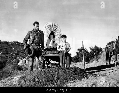 George Montgomery, Bobby Clark, am Set des Westernfilms Gun Duel in Durango, United Artists, 1957 Stockfoto