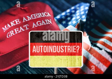 FOTOMONTAGE, Schild mit Deutschlandfahne und Aufschrift Autoindustrie vor gerissener US-Fahne und Trump-Mütze *** FOTOMONTAGE, Schild mit deutscher Flagge und Aufschrift Autoindustrie vor gerissener US-Flagge und Trump-Kappe Stockfoto