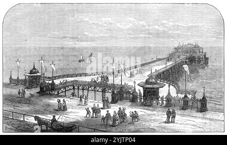 Der neue Pier in Hastings, [Sussex], 1872. „Dieser Pier ist einer der von Herrn Eugenius Birch entworfenen Pfeiler, bestehend aus einer Reihe von gusseisernen Säulen, die unten mit Schraubpfählen befestigt sind, die schmiedeeiserne Diagonalträger stützen, auf denen ein breites Holzdeck gelegt ist... die gesamte Länge vom Ufer beträgt 910 m... der Salon oder Pavillon, im orientalischen Stil, beträgt 150 m. Lang und 100 Fuß Breit...es bietet Platz für 2000 Personen...es gibt zwei Eingänge zum Pier, einer auf jeder Seite; dazwischen ist ein großer quadratischer Raum offen gelassen, und der Durchgang an jedem Eingang ist über einem eisernen Gitter, ins Stockfoto