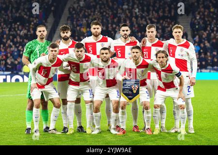 (Von links nach rechts, von hinten nach vorn) Kroatien Torhüter Dominik Kotarski, Josko Gvardiol, Duje Caleta-Car, Josip Sutalo, Luka Sucic, Kristijan Jakic, der kroatische Petar Sucic, Martin Baturina, Mateo Kovacic, Andrej Kramaric und Luka Modric (rechts) während des Gruppenspiels der UEFA Nations League in Hampden Park, Glasgow. Bilddatum: Freitag, 15. November 2024. Stockfoto