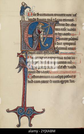 Initial E: David spielt die Harfe und ein Mann heaving a Rock, Text and Illumination um 1285. David, der als Autor der Psalmen galt, ist hier in einer Initiale zu Psalm 80 zu sehen, die sich auf der Harfe aufhält. Das elegante Instrument endet im Kopf eines Tieres, wie der des skurrilen geflügelten Geschöpf unterhalb der Initiale. Über David ist ein Mann mit Felsen zu sehen, was sich auf die Zeile „Er hat seine Schulter von den Lasten befreit“ im Text des Psalms beziehen könnte. Stockfoto