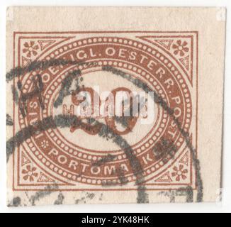 ÖSTERREICH — 1899. Dezember: 20 heller braune Briefmarke der Österreichischen Monarchie. Zahl (Ziffer) in einem ovalen Rahmen mit geometrischem und floralem Ornament Stockfoto