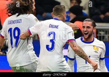 Adrien Rabiot (Olympique de Marseille) aus Frankreich feiert, nachdem er sein drittes Tor beim Fußballspiel der UEFA Nations League zwischen Italien und Frankreich am 17. November 2024 im San Siro Stadion in Mailand erzielt hat Stockfoto