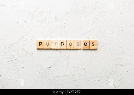 Zweck Wort auf Holzblock geschrieben. Zweck Text auf Tisch, Konzept. Stockfoto