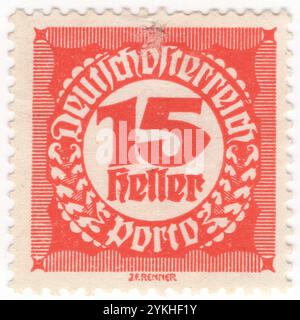 ÖSTERREICH — 1920: 15 heller heller roter Briefmarken mit einer Wertzahl in einem kreisförmigen Rahmen mit geometrischem Ornament im Stil des Blackletters, auch als gotische Schrift, gotischer Minuskel oder gotischer Typ bekannt, war eine Schrift, die in ganz Westeuropa verwendet wurde. Neben der italienischen Schrift und der römischen Schrift war der Schwarze Buchstabe eine der wichtigsten Schriften in der Geschichte der westlichen Typografie. Fragen der Republik Stockfoto