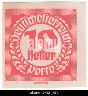 ÖSTERREICH — 1920: 10 heller hellroter Imperf. Der Briefstempel mit einer Zahl in einem kreisförmigen Rahmen mit geometrischen Ornamenten im Stil von Blackletter, auch als gotische Schrift, gotischer Minuskel oder gotischer Typ bekannt, war eine Schrift, die in Westeuropa verwendet wurde. Neben der italienischen Schrift und der römischen Schrift war der Schwarze Buchstabe eine der wichtigsten Schriften in der Geschichte der westlichen Typografie. Fragen der Republik Stockfoto