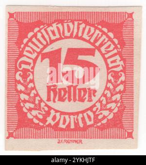 ÖSTERREICH — 1920: 15 heller hellroter Imperf. Der Briefstempel mit einer Zahl in einem kreisförmigen Rahmen mit geometrischen Ornamenten im Stil von Blackletter, auch als gotische Schrift, gotischer Minuskel oder gotischer Typ bekannt, war eine Schrift, die in Westeuropa verwendet wurde. Neben der italienischen Schrift und der römischen Schrift war der Schwarze Buchstabe eine der wichtigsten Schriften in der Geschichte der westlichen Typografie. Fragen der Republik Stockfoto