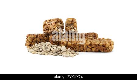 Eine Kollektion knuspriger Snackbars aus Sonnenblumenkernen und Nüssen, ideal für einen gesunden Lebensstil. Perfekt für Energie und Ernährung unterwegs. Stockfoto