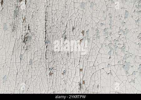 Alte Farbe zerrissen und blätterte auf Holzbrett, verfaulte Farbstruktur Stockfoto