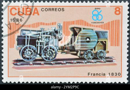 Gestempelte Briefmarke, gedruckt von Kuba, die die Lokomotive France 1830 zeigt, um 1986. Stockfoto
