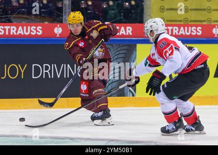 Genf, Schweiz. November 2024. Genf, Schweiz, 20. November 2024: Eric schneller (27 Geneve-Servette HC) schießt den Puck (Action) während des Champions Hockey League Spiels zwischen Geneve-Servette HC und HC Lausanne in Les Vernets in Genf (Giuseppe Velletri/SPP) Credit: SPP Sport Press Photo. /Alamy Live News Stockfoto