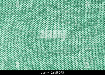 Gemischter weißer und grüner gestrickter Stoff, Kaschmir-Wollstoff-Textur. Hintergrund Strickgewebe, Jersey-Textil-Struktur, Tuchoberfläche, W Stockfoto