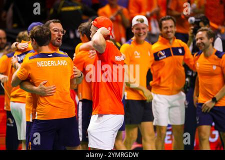 22. November 2024, Spanien, Málaga: Tennis, Männer: Davis Cup - K.-o.-Runde, Halbfinale, Deutschland - Niederlande. Struff (Deutschland) - Griekspoor (Niederlande). Das niederländische Team feiert. Foto: Frank Molter/dpa Stockfoto