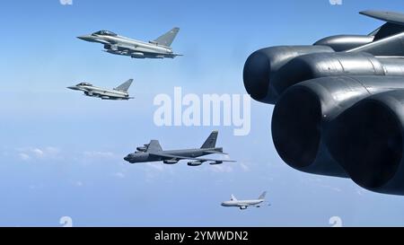 Zwei Eurofighter-Taifune der Royal Air Force und ein Luftbetanker der RAF Voyager fliegen in Formation mit zwei strategischen bom der U.S. Air Force B-52H Stratofortress Stockfoto