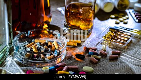 Süchtig machenden Substanzen, einschließlich Alkohol, Zigaretten und Drogen. Stockfoto