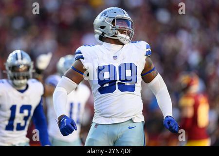 Landover, MD, USA. November 2024. Dallas Cowboys Defensive End Chauncey Golston (99) reagiert nach einem Sack während des NFL-Spiels zwischen den Dallas Cowboys und den Washington Commanders in Landover, MD Reggie Hildred/CSM/Alamy Live News Stockfoto