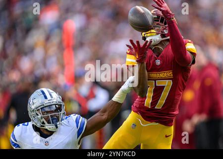 Landover, MD, USA. November 2024. Terry McLaurin (17) holt sich einen Fang gegen den Dallas Cowboys Cornerback Jourdan Lewis (2) während des NFL-Spiels zwischen den Dallas Cowboys und den Washington Commanders in Landover, MD Reggie Hildred/CSM/Alamy Live News Stockfoto