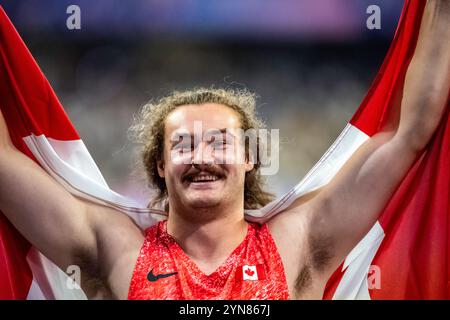 Ethan Katzberg (CAN) gewinnt bei den Olympischen Sommerspielen 2024 die Goldmedaille im Hammerwurf der Männer. Stockfoto