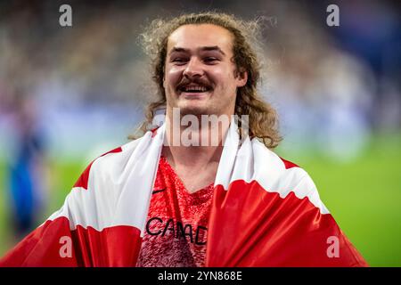 Ethan Katzberg (CAN) gewinnt bei den Olympischen Sommerspielen 2024 die Goldmedaille im Hammerwurf der Männer. Stockfoto