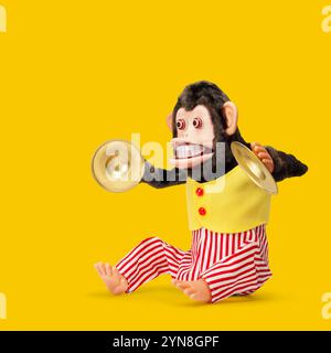 Spielzeug-Affen klatschen Cymbals Stockfoto