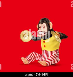 Spielzeug-Affen klatschen Cymbals Stockfoto