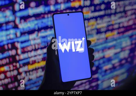 In dieser Abbildung wird das Wiz-Logo auf einem Smartphone-Bildschirm angezeigt Stockfoto