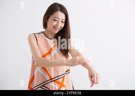 Frau mit Schweißtüchern Stockfoto