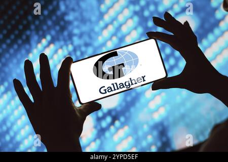 Februar 2024, Brasilien. In dieser Fotoabbildung wird das Arthur J. Gallagher (AJG) Logo auf einem Smartphone-Bildschirm angezeigt Stockfoto