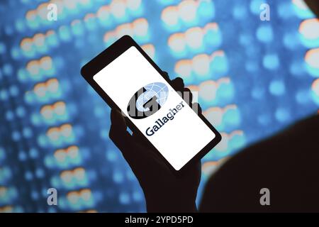 Februar 2024, Brasilien. In dieser Fotoabbildung wird das Arthur J. Gallagher (AJG) Logo auf einem Smartphone-Bildschirm angezeigt Stockfoto