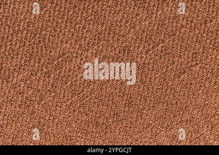 Orangefarbener Jacquard-Stoff mit diagonal gewebtem, grobgewebtem Polsterstoff. Textilhintergrund, Möbel Textilmaterial, Tapete, Backdro Stockfoto