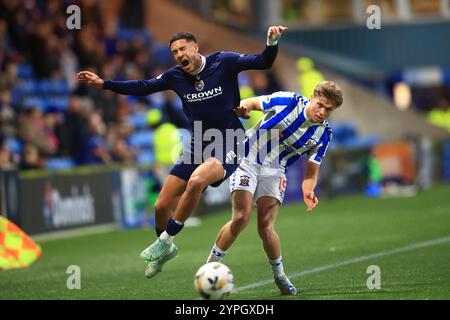 30. November 2024; Rugby Park, Kilmarnock, Schottland: Scottish Premiership Football, Kilmarnock gegen Dundee; Ethan Ingram of Dundee wird von Fraser Murray aus Kilmarnock bemängelt Stockfoto