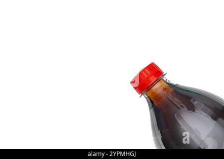 Nahaufnahme der Cola Softdrink Flasche, die in Frame kommt. Stockfoto
