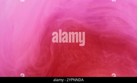 Abstrakte Farbe. Wirbelnde Tinte. Defokussierte hellrosa rote Farbe Rauchnebel Wolke Vortex Rauch Dampf Bewegung auf Kunsthintergrund. Stockfoto